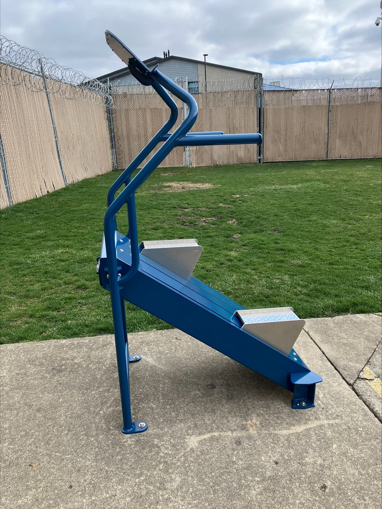 Correctional facility prison yard with Outdoor-Fit's Everest Cardio Climber