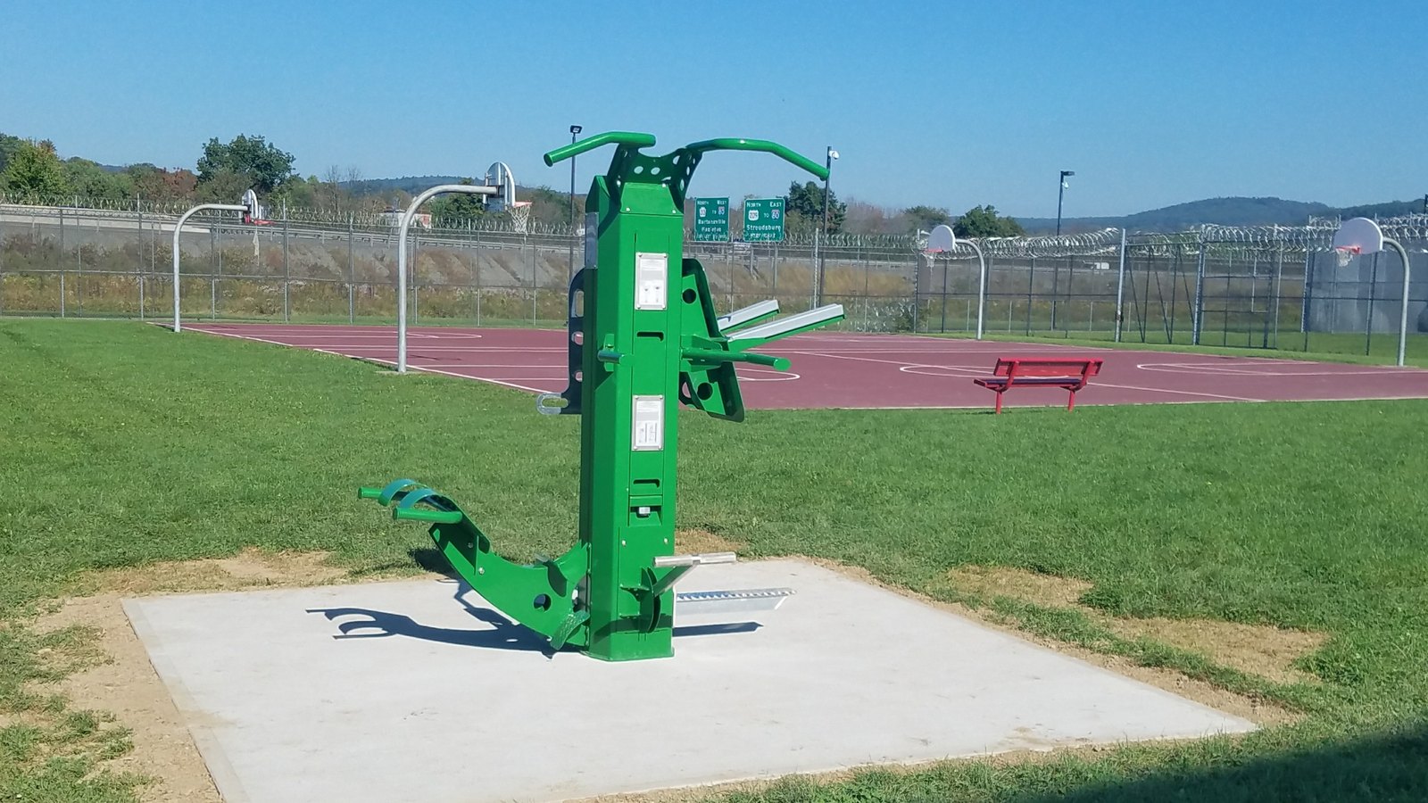 Outdoor-Fit correctional fitness equipment installed in a prison recreation yard